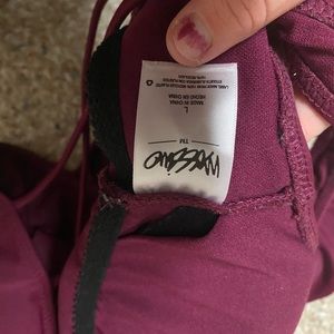 One piece swim suit.. never worn..  cross tie in the front